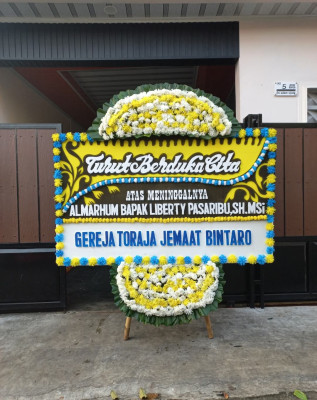 Papan Bunga Duka di Sario